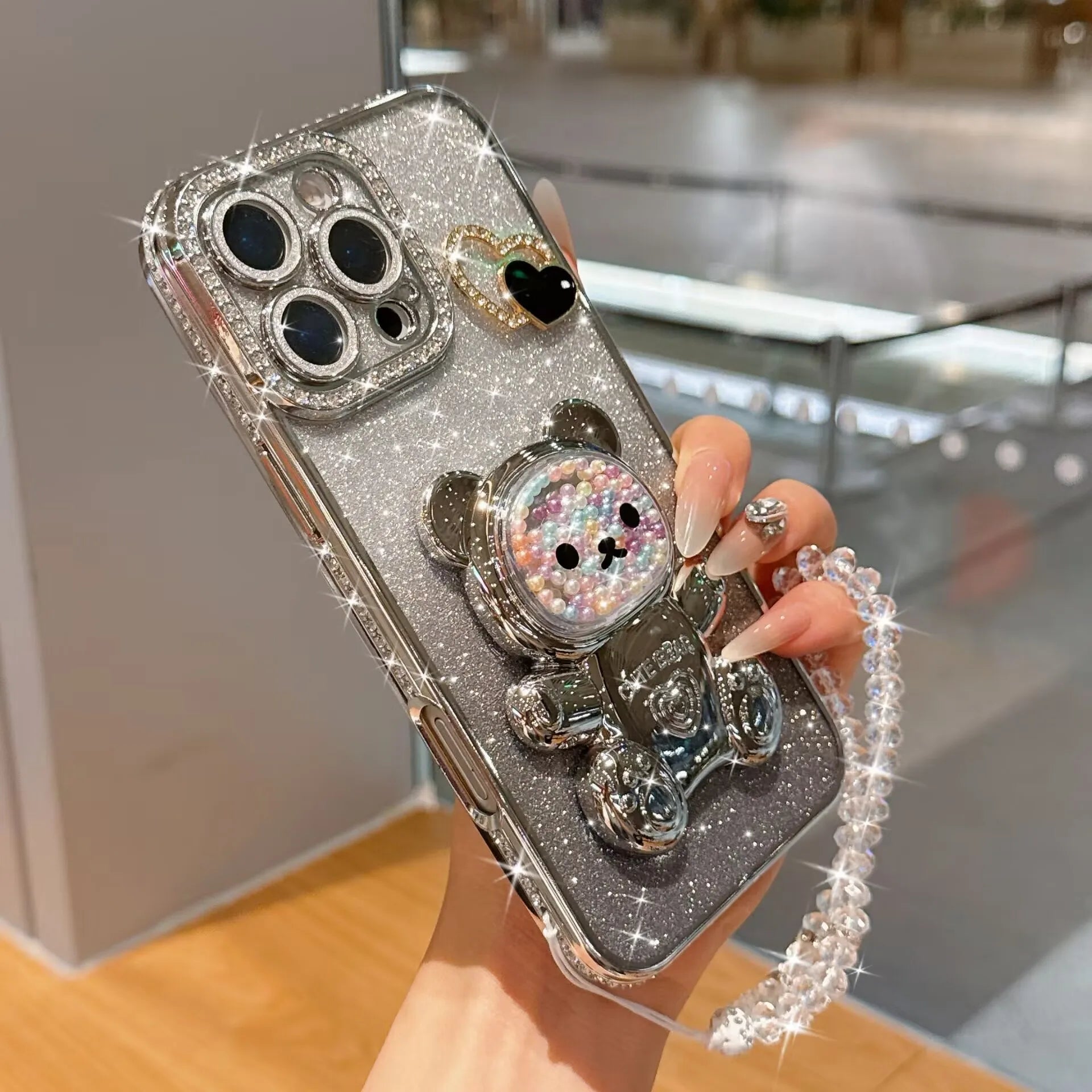 Étui souple brillant, orné d'un ours en perles colorées et plaqué électrolytiquement, compatible avec les iPhone 17, 16, 14, 15, 13, 12 et 11. Chaîne de perles.